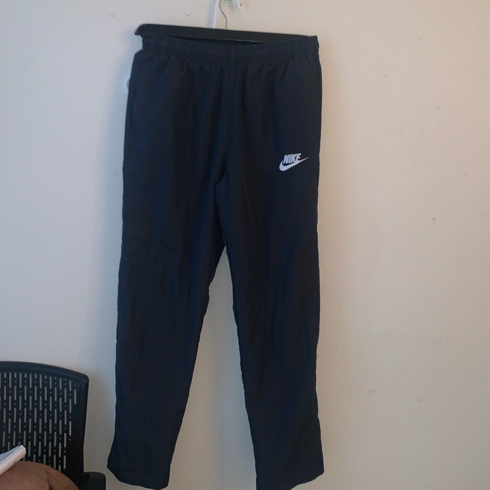 Nike track pants. Size M